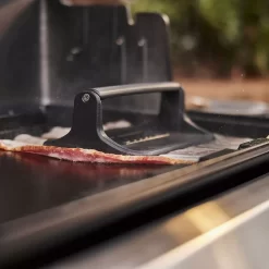 Weber Griddle Press (WEB-6785) -Barbecue Shop web 6785 c 04 23